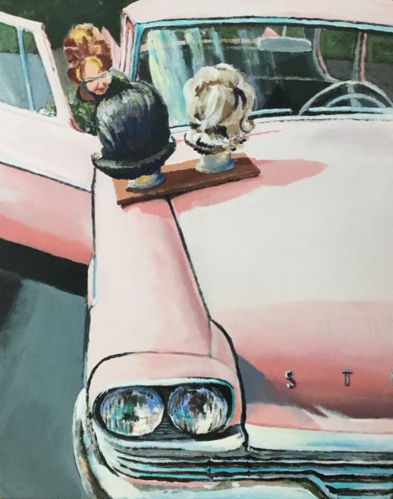 Pink classic car with mannequin heads